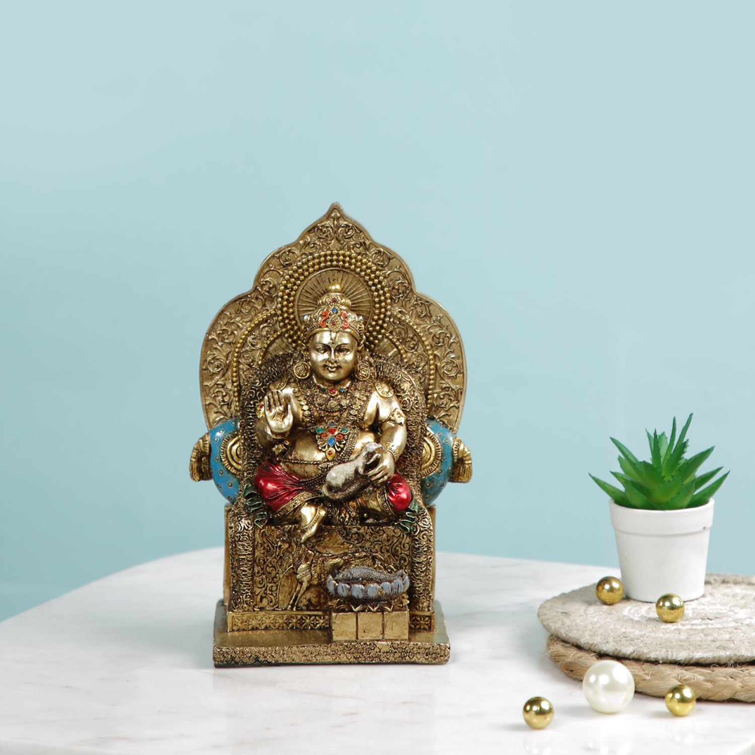 Statue of Kuber Dev Sitting on Throne